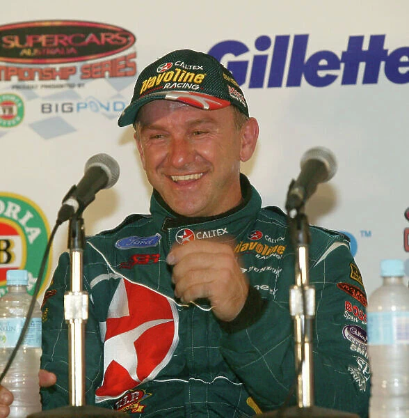 2003 Australian V8 Supercars Surfers Paradise, Australia. October 25th 2003. Russell Ingall celebrates his victory at the Gillette V8 Supercar event at the Lexmark Indy 300 at the Sufer's Paradise street circuit. World Copyright