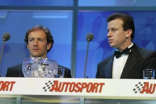 2003 AUTOSPORT AWARDS, The Grosvenor, London. 7th December 2003. Christiano Da Matta and Olivier Panis present the Paul Warwick trophy for best National driver. Photo: Peter Spinney / LAT Photographic Ref: Digital Image only