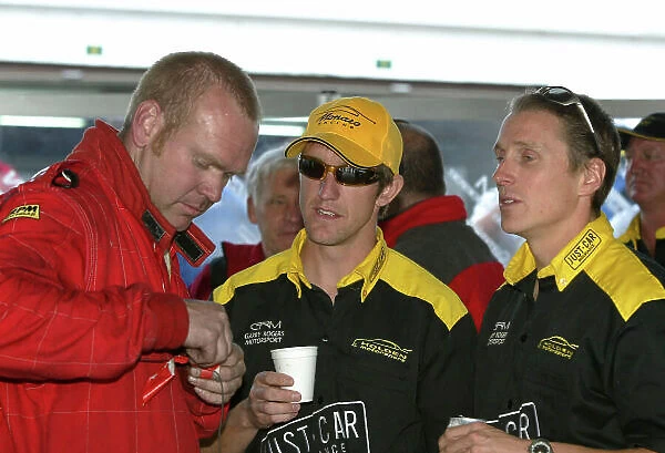 2003 Barthurst 24 Hours Mt Panorama, Australia. 21st-23rd November 2003. Holden Monaro 427 drivers Cameron McConville (right) and Nathan Pritty talk with crew during the Bathurst 24hr. World Copyright: Mark Horsburgh / LAT Photographic