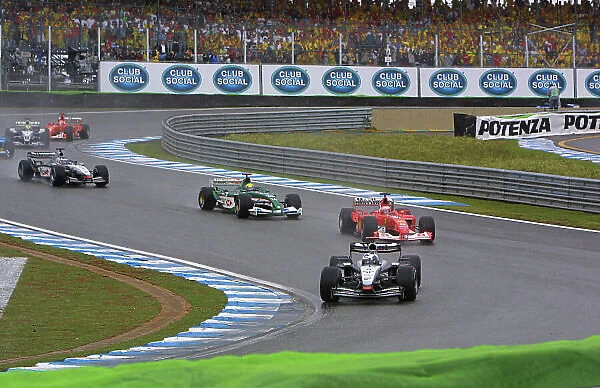 2003 Brazilian Grand Prix - Sunday Race Interlagos, Brazil. 6th April 2003. David Coulthard, West McLaren Mercedes MP4 / 17D, leads. World Copyright LAT Photographic. ref: Digital Image Only