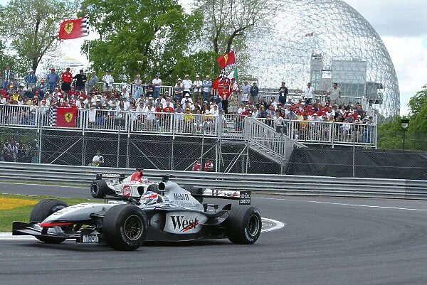 2003 Canadian Grand Prix - Sunday race, Montreal, Canada. 15th June 2003. Kimi Raikkonen, Team McLaren Mercedes MP4 / 17D, action. World Copyright LAT Photographic. Digital Image Only
