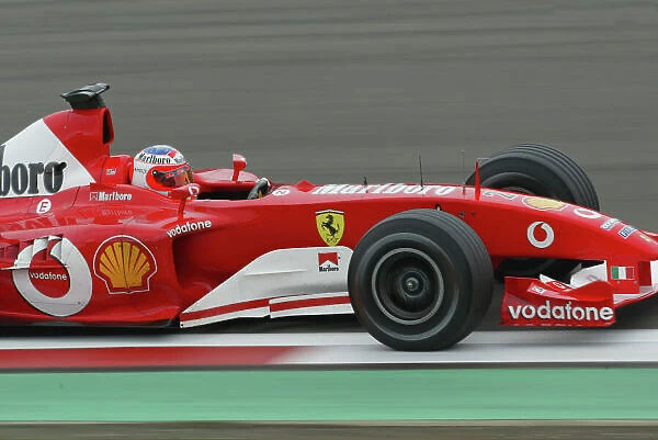 2003 European Grand Prix - Saturday Qualifying, Nurburgring, Germany. 28th June 2003. Rubens Barrichello, Ferrari F2003 GA, action. World Copyright LAT Photographic. Digital Image Only