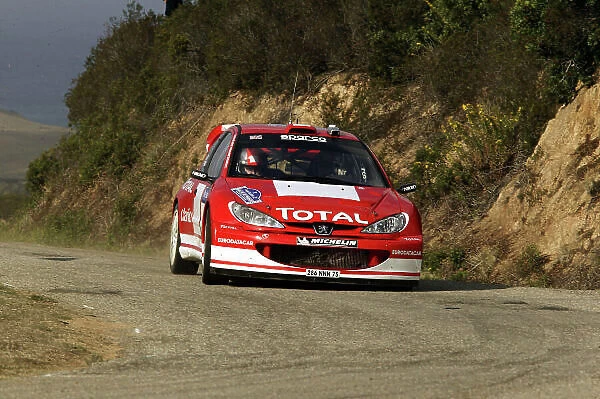 2003 FIA World Rally Champs. Round Twelve Corsica Rally 16th-19th October 2003. Richard Burns, Peugeot, action