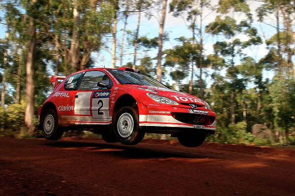 2003 FIA World Rally Champs. Round Ten Telstra Rally Australia 4th-7th September 2003. Richard Burns, Peugeot, Action