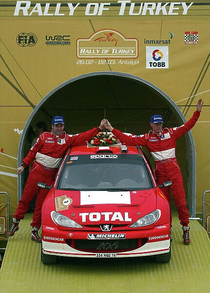 2003 FIA World Rally Champs. Round Three, Turkey, 26th February - 2nd March 2003 Richard Burns, Peugeot, Podium. World Copyright: McKlein / LAT