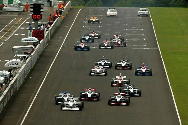 2003 Formula Nippon Championship Sugo, Japan. 27th July 2003. Start of the race. World Copyriht: Yasushi Ishihara / LAT Photographic ref: Digital Image Only