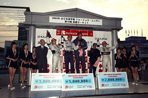 2003 Formula Nippon Championship Suzuka, Japan. 2nd November 2003. Race podium - Juichi Wakisaka (1st), Takashi Kogure (2nd) and Satoshi Motoyama (3rd). World Copyright: Yasushi Ishihara  /  LAT Photographic ref: Digital Image Only