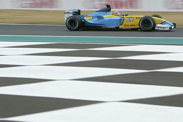 2003 French Grand Prix - Friday Qualifying, Magny-Cours, France. 4th July 2003. Fernando Alonso, Renault R23, action. World Copyright LAT Photographic. Digital Image Only