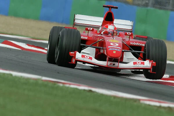 2003 French Grand Prix - Saturday Qualifying, Magny-Cours, France. 5th July 2003. Michael Schumacher, Ferrari F2003 GA, action. World Copyright LAT Photographic. Digital Image Only