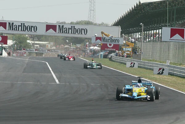 2003 Hungarian Grand Prix -Sunday Race, Budapest, Hungary. 24th August 2003. Fernando Alonso, Renault R23, leads the race. World Copyright LAT Photographic. Digital Image Only