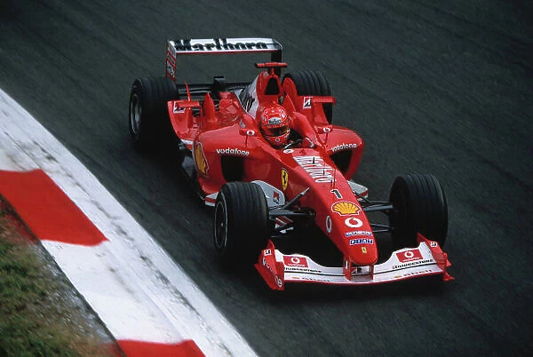 2003 Italian Grand Prix, Monza, Italy. 12th - 14th September 2003 Michael Schumacher, Ferrari F2003 GA, race action. World Copyright LAT Photographic / PICME. ref:35mm image