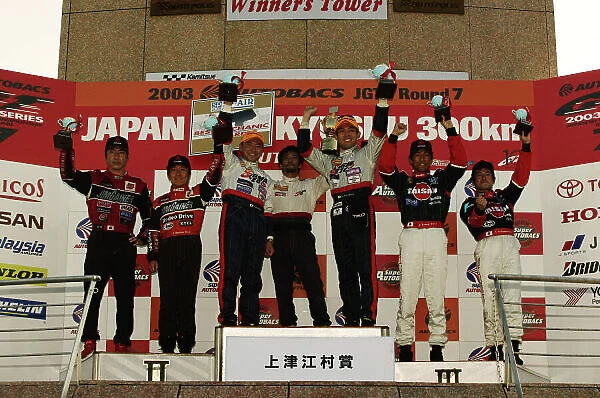 2003 Japanese GT Championship Autopolis, Japan. 26th October 2003. GT300 Race podium. World Copyright: Yasushi Ishihara / LAT Photographic ref: Digital Image Only