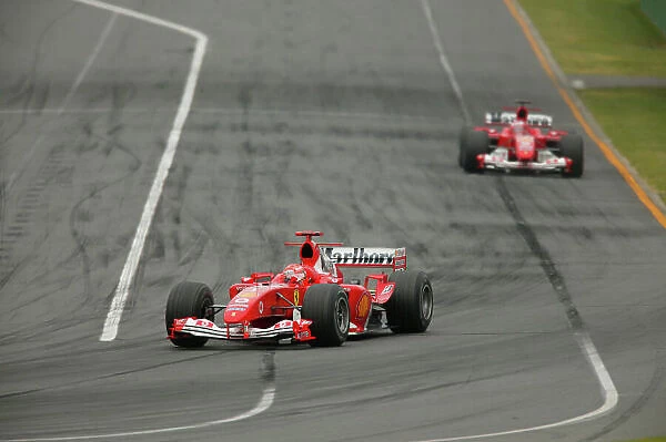 2004 Australian Grand Prix-Sunday race Melbourne, Australia. 7th March 2004 Michael Schumcaher, Ferrari F2004, leads Rubens Barrichello, Ferrari, F2004, race action. World Copyright LAT Photographic Digital image only
