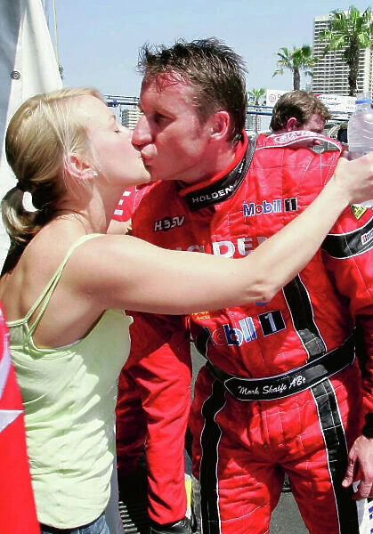 2004 Australian V8 Supercars Surfers Paradise, Australia. 21st - 24th October 2004 Mark Skaife (Holden Commodore VY) gets a kiss, hopefully from his wife. World Copyright: Mark Horsburgh / LAT Photographic ref: Digital Image Only