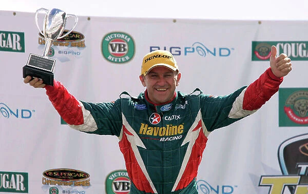 2004 Australian V8 Supercars Symmons Plain Raceway, Tasmania. November 14th. V8 Supercar driver Russell Ingall took his first round win for the year at Round 12. Podium. World Copyright: Mark Horsburgh / LAT Photographic ref: Digital Image Only
