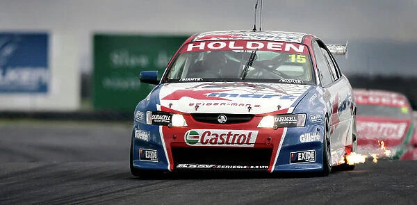 2004 Australian V8 Supercars Symmons Plain Raceway, Tasmania. November 14th. V8 Supercar driver Rick Kelly in action during race 1. Kelly went on to win the race ahead of Marcos Ambrose 2nd and elder brother Todd Kelly in 3rd