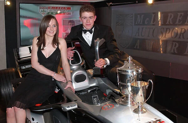 2004 Autosport Awards Grosvenor House, London. 5th December. Paul Di / Resta, young driver of the year with girlfriend and his awards. World Copyright: Jeff Bloxham / LAT Photographic ref: Digital Image Only