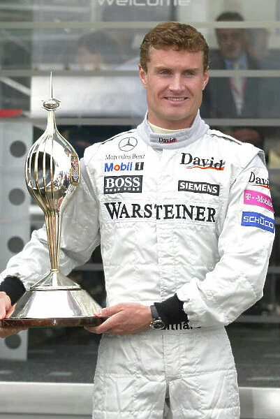 2004 British Grand Prix-Sunday Race, Silverstone, England. 11th July 2004. David Coulthard, McLaren Mercedes MP4 / 19, portrait. World Copyright LAT Photographic. Digital Image only (a high res version is available on request)