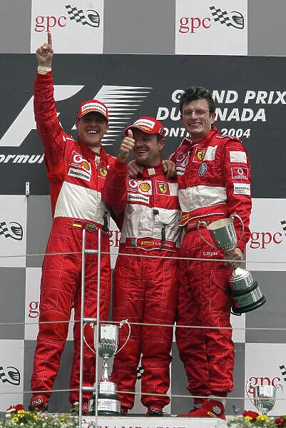 2004 Canadian Grand Prix - Sunday Race, 2004 Canadian Grand Prix Montreal, Canada. 13th June 2004 Race winner Michael Schumacher, Ferrari F2004, celebrates with engineer Chris Dyer and team mate Rubens Barrichello, Ferrari F2004