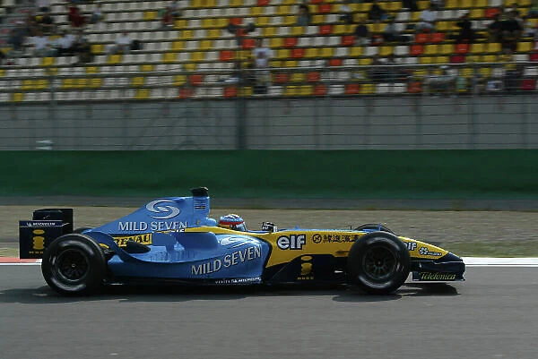 2004 Chinese Grand Prix-Friday Practice, Shanghai International circuit, Shanghai, China. 23rd September 2004 Fernando Alonso, Renault R24, action. World Copyright LAT Photographic. Digital image only