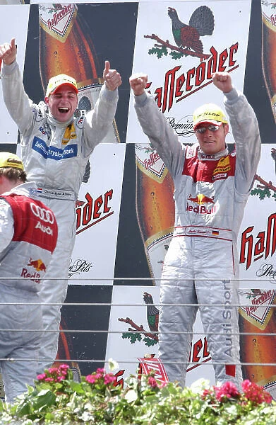 2004 DTM Championship Estoril, Portugal. 1st - 2nd May 2004. RAce winner Christijan Albers (HWA Mercedes C-Class) and Martin Tomczyk (Abt Sportsline Audi A4) 3rd - podium. World Copyright: Andre Irlmeir / LAT Photographic ref: Digital Image Only