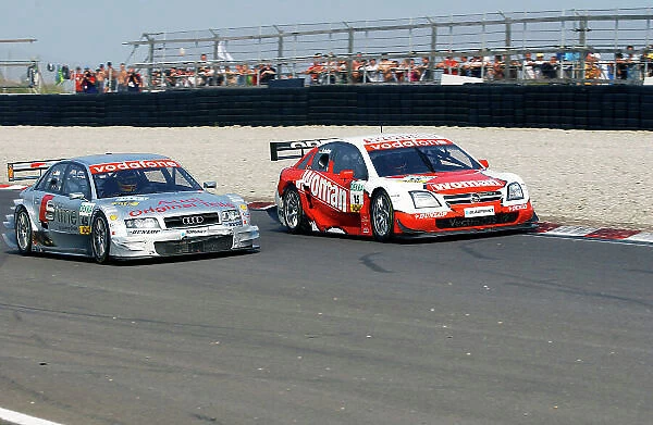 2004 DTM Championship Zandvoort, Netherlands. 4th - 5th September. Timo Scheider (OPC Holzer Opel Vectra GTS) leads Frank Biela (Joest Audi A4). Action. World Copyright: Andre Irlmeier / LAT Photographic ref: Digital Image Only