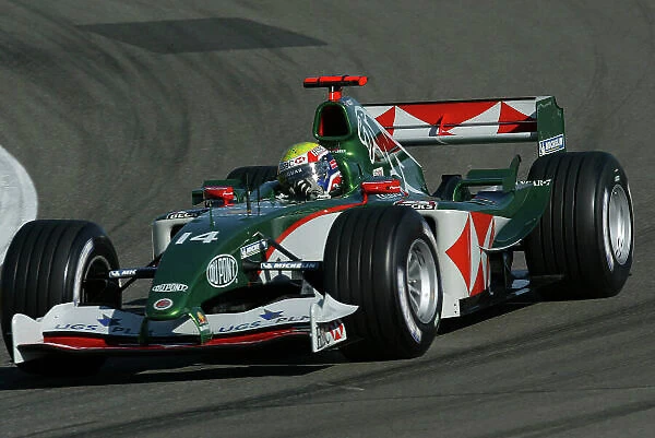 2004 European Grand Prix-Qualifying, Nurburgring, Germany. 29th May 2004 Mark Webber, Jaguar R5, action. World copyright: LAT Photographic ref: Digital image only (a high res version is available on request)Eur_04_Sat_D014