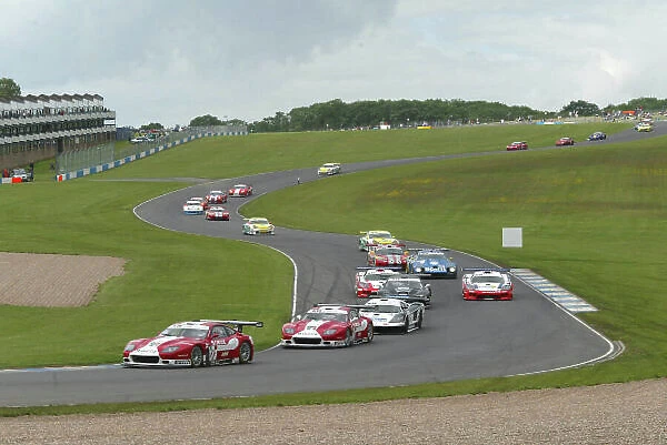 2004 FIA GT Championship Donington Park, England. June 26th - 27th Peter / Babini (Ferrari 575M Maranello) leads into the Old Hairpin as the rest of the field tackle the Craner Curves. Action