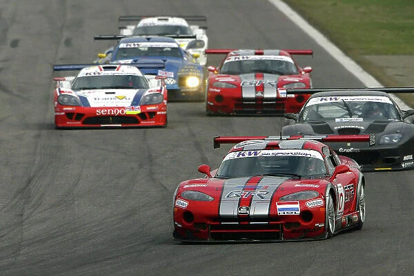 2004 FIA GT Championship Monza, Italy. 25th - 27th March. The Chrysler Viper GTS-R of Zwaan, Bouchut and Goossens leads the pack. Action. World Copyright: Photo4 / LAT Photographic ref: Digital Image Only