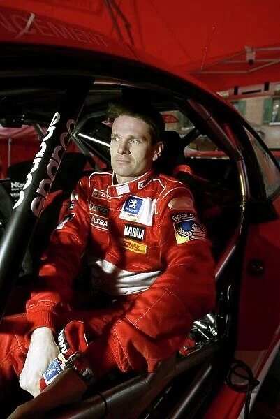 2004 FIA World Rally Championship Monte Carlo Rally, Monte Carlo, 23rd - 25th January. Marcus Gronholm (Peugeot 307 WRC). Sits in his car. Portrait. World Copyright: McKlein / LAT ref: Digital Image Only