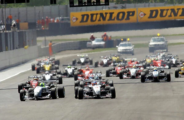 2004 Formula Three Euroseries Aidria, Italy. 15th - 16th May 2004. Race 1 winner Jamie Green (ASM Formule 3), leads Adrain Sutil (Kolles) at the start of the race World Copyright: Andre Irlmeier / LAT Photographic ref: Digital Image Only