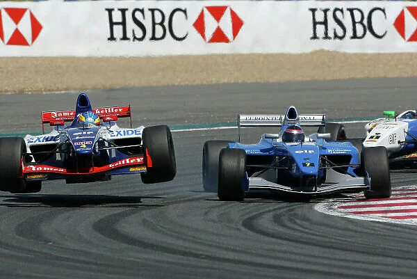 2004 Formula Renault V6 Eurocup Magny-Cours, France. 1st - 2nd May 2004. Ryan Sharp (Jenzer Motorsport), bangs wheels with Giorgio Mondini (EuroInternational), action. World Copyright: Photo4 / LAT Photographic ref: Digital Image Only