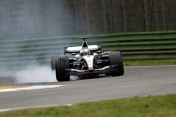 2004 Formula One Testing Imola, Italy. 24th February 2004. David Coulthard, McLaren Mercedes MP4-19, locks up under breakinbg, action. World Copyright: Photo4 / LAT Photographic ref: Digital Image Only