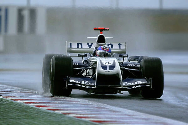 2004 French Grand Prix-Friday practice, Magny-Cours, France. 2nd July 2004. Juan Pablo Montoya, BMW Williams FW26, action. World Copyright LAT Photographic. Digital Image only (a high res version is available on request)