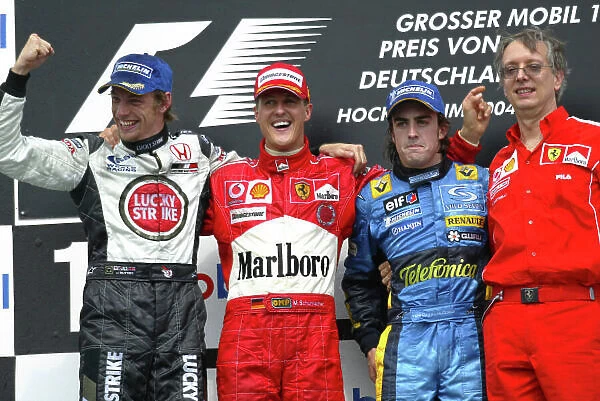 2004 German Grand Prix-Sunday Race, Hockenheim, Germany. 25th July 2004. Michael Schumacher, Ferrari F2004, Jenson Button, BAR Honda 006 and Fernando Alonso, Renault R24 on the podium. World Copyright LAT Photographic / Charles Coates