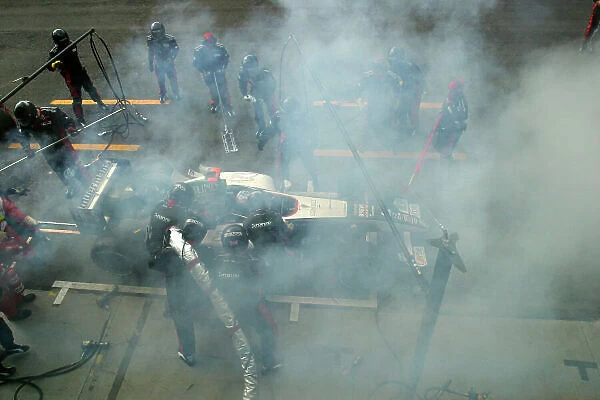 2004 Italian Grand Prix. Monza Italy 10th - 12th September. Gianmaria Bruni's Minardi Cosworth PS04B catches fire during a pitstop due to a fault with the refueling rig. Both driver and team escaped serious injury