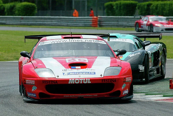 2004 Le Mans Endurance Series, Monza, Italy. 8th May 2004. The Larbre Ferrari 550 of Lamy, Bouchut and Zacchia holds off the Saleen Mustang of Alzen, Bartels and Konrad. World Copyright: Brooks / LAT Photographic. Ref: Digital Image only