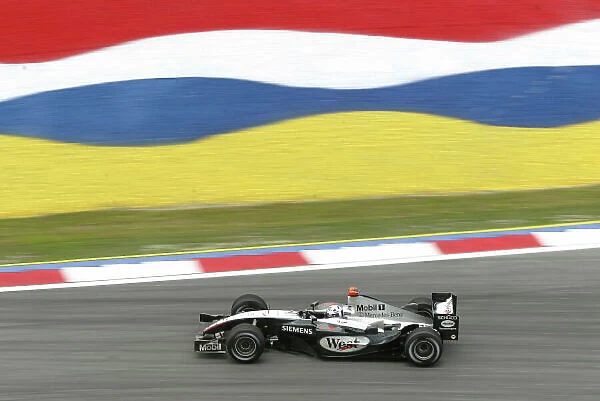 2004 Malaysian Grand Prix-Friday practice, Sepang, Malaysia. 19th March 2004 David Coulthard, McLaren Mercedes MP4-19, action. World copyright LAT Photographic. Digital image only