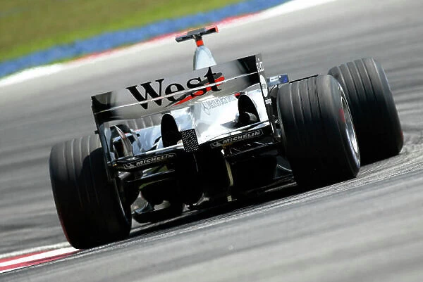 2004 Malaysian Grand Prix-Saturday Qualifying, Sepang, Malaysia. 20th March 2004 David Coulthard, McLaren Mercedes MP4-19, action. World copyright LAT Photographic. Digital image only
