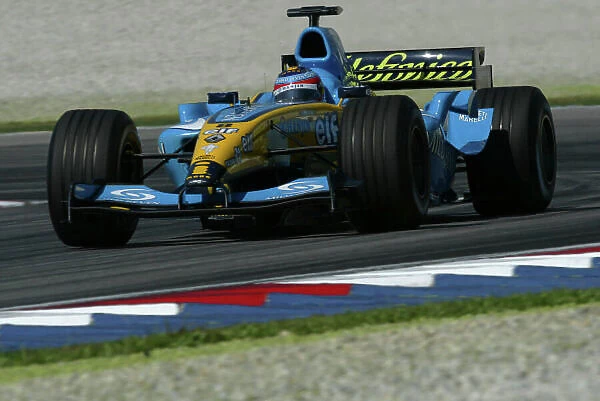 2004 Malaysian Grand Prix-Saturday Qualifying, Sepang, Malaysia. 20th March 2004 Fernando Alonso, Renault R24, action. World copyright LAT Photographic. Digital image only