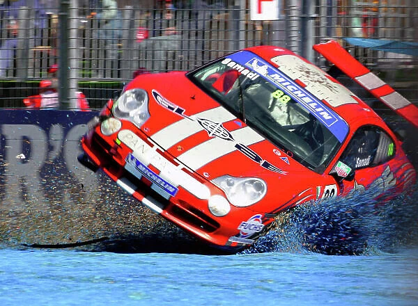 2005 Australian Porsche Carrera Cup Albert Park, Melbourne, Australia. 4th - 6th March. Ash Samadi (Globe Racing) crashes. Action. World Copyright: Mark Horsburgh / LAT Photographic ref: Digital Image Only