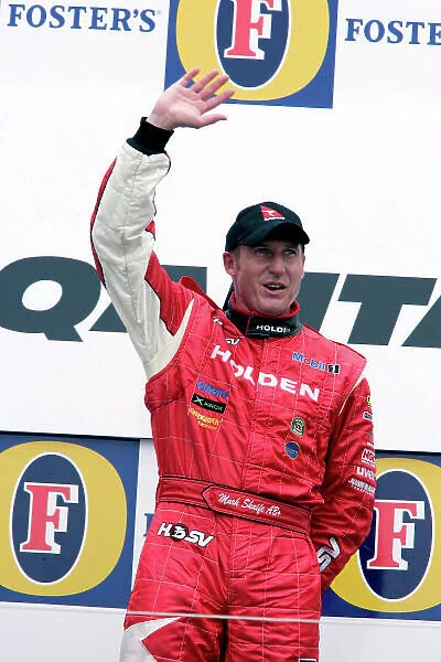 2005 Australian V8 Supercars Albert Park, Melbourne, Australia. 4th - 6th March. Mark Skaife celcbrates on the podium after race 3. Portrait. World Copyright: Mark Horsburgh / LAT Photographic ref: Digital Image Only