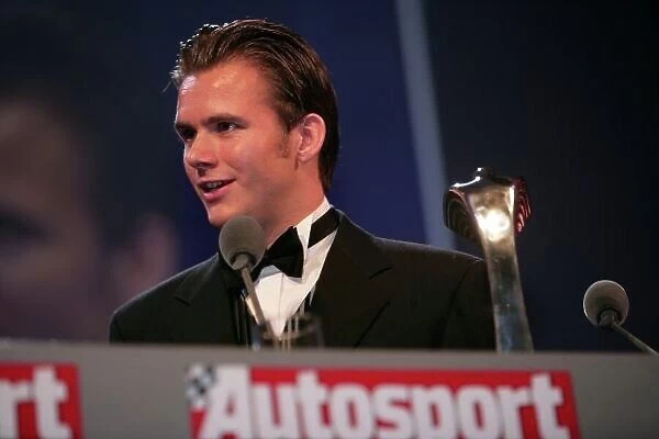 2005 Autosport Awards Grosvenor House, London. 4th December. Dan Wheldon receives the British Competition Driver Award. Portrait. World Copyright: Peter Spinney / LAT Photographic ref: Digital Image Only