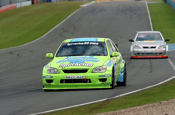 2005 British Touring Car Championship Donington Park, England. 10 / 04 / 05 Richard Williams (HPI Racing Lexus IS200) leads Mark Proctor (Fast-Tec Motorsport Vauxhall Astra Coupe). Action