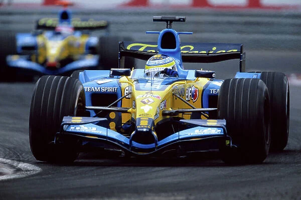 2005 Canadian Grand Prix Montreal, Canada. 10th - 12th June 2005 Giancarlo Fisichella, Renault R25, leads team mate Fernando Alonso, Renault R25. Action. World Copyright: CLorenzo Bellanca / LAT Photographic ref: 50mb 35mm Image 05Can05