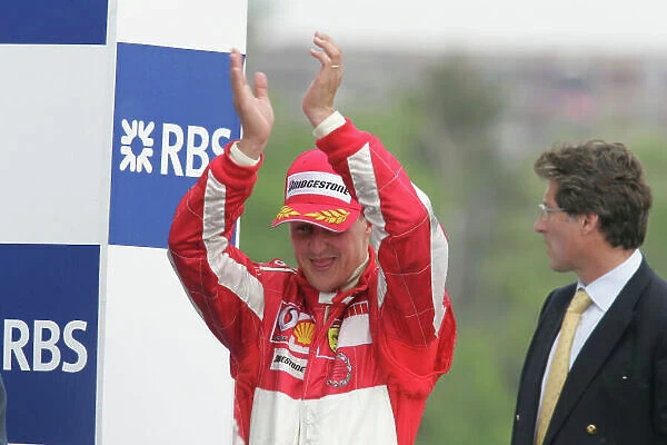 2005 Canadian Grand Prix - Sunday Race, Montreal, Canada. 12th June 2005 Race podium - Michael Schumacher, Ferrari F2005 (2nd), celebrates. World Copyright: Lorenzo Bellanca / LAT Photographic ref