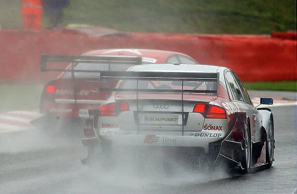 2005 DTM (German Touring Car) Championship Spa-Francorchamps, Belgium. 13th - 15th May 2005. Tom Kristensen (Abt Audi A4) batttles with Heinz Harald Frentzen (Opel Vectra GTS V8). Action