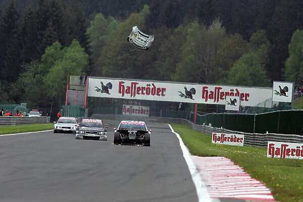 2005 DTM (German Touring Car) Championship Spa-Francorchamps, Belgium. 13th - 15th May 2005. Bruno Spengler (Junge Gebrauchte AMG-Mercedes C-Klasse) looses his front bonnet as it flies into the air