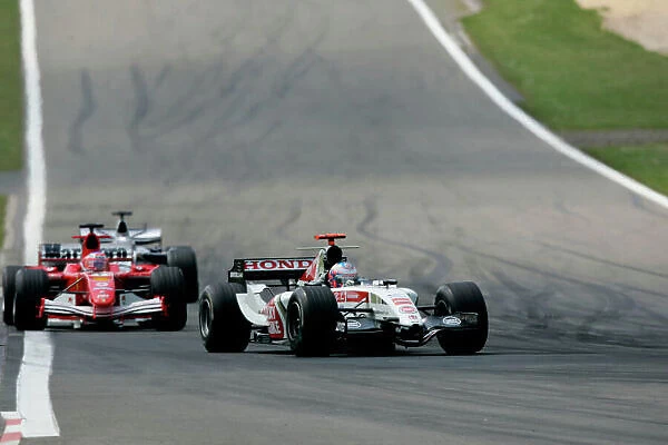 2005 European Grand Prix - Sunday Race. Nurburgring, Germany. 29th May 2005 Jenson Button, BAR Honda 007 leads Rubens Barrichello, race action. World Copyright: Peter Spinney / LAT Photographic ref