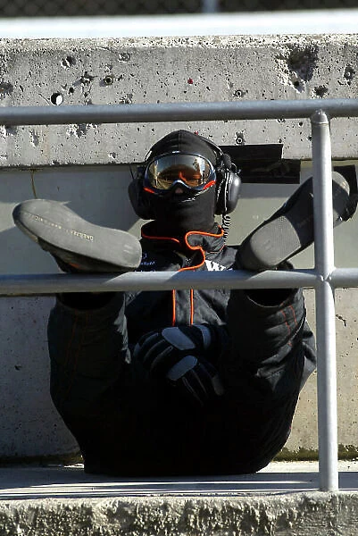 2005 Formula One Testing Barcelona, Spain. 16th February 2005. A McLaren team member takes a break. World Copyright: Malcolm Griffiths / LAT Photographic ref: Digital Image Only
